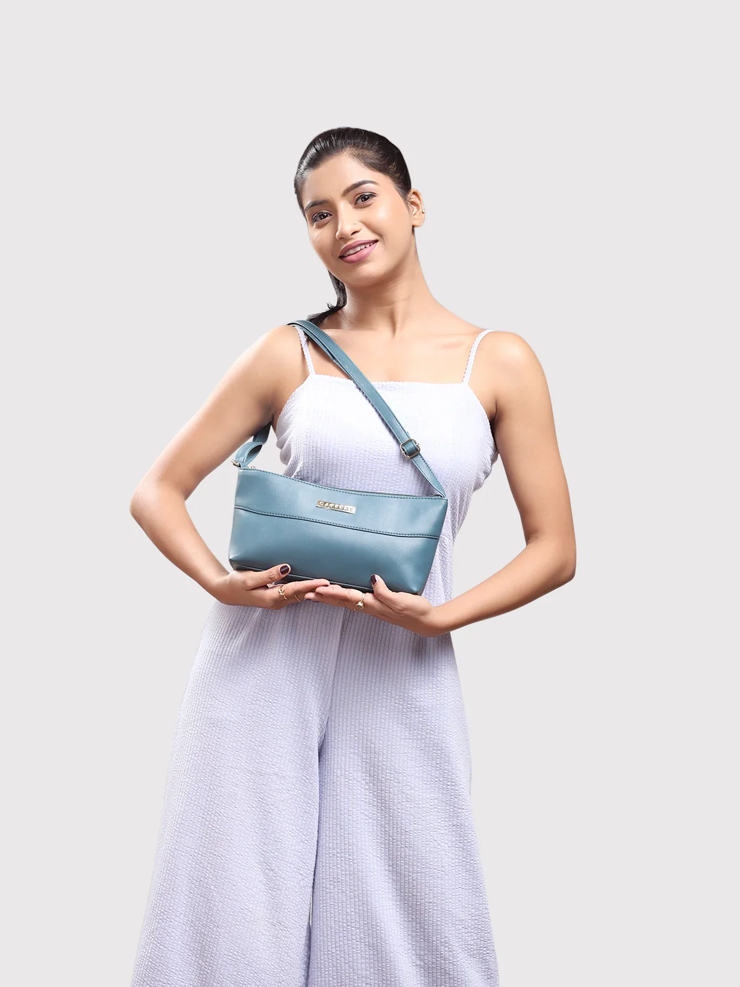 Caprese Clairice Small Teal Sling Bag - Image 2