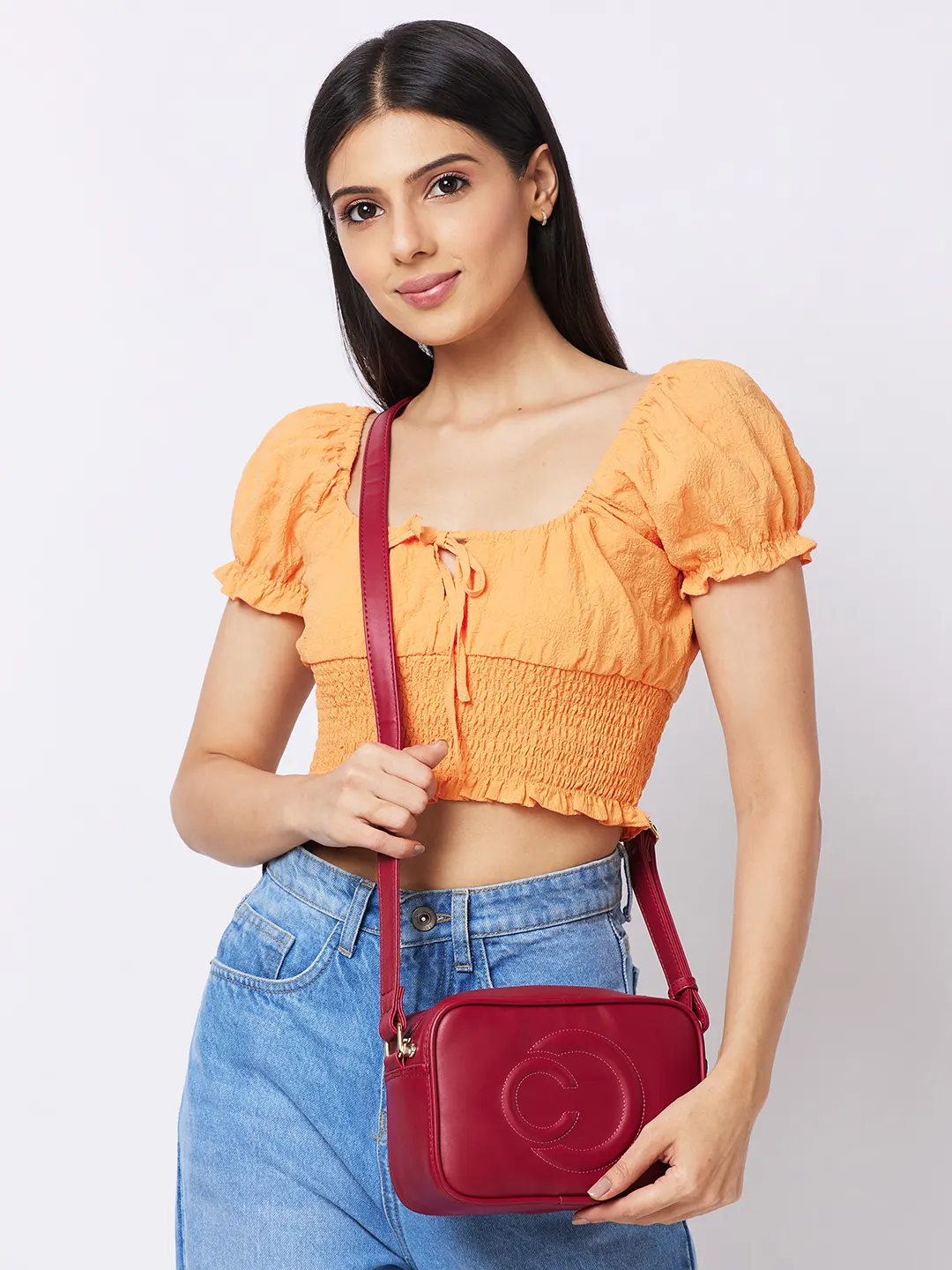 Caprese Dora Medium Burgundy Sling Bag - Image 11