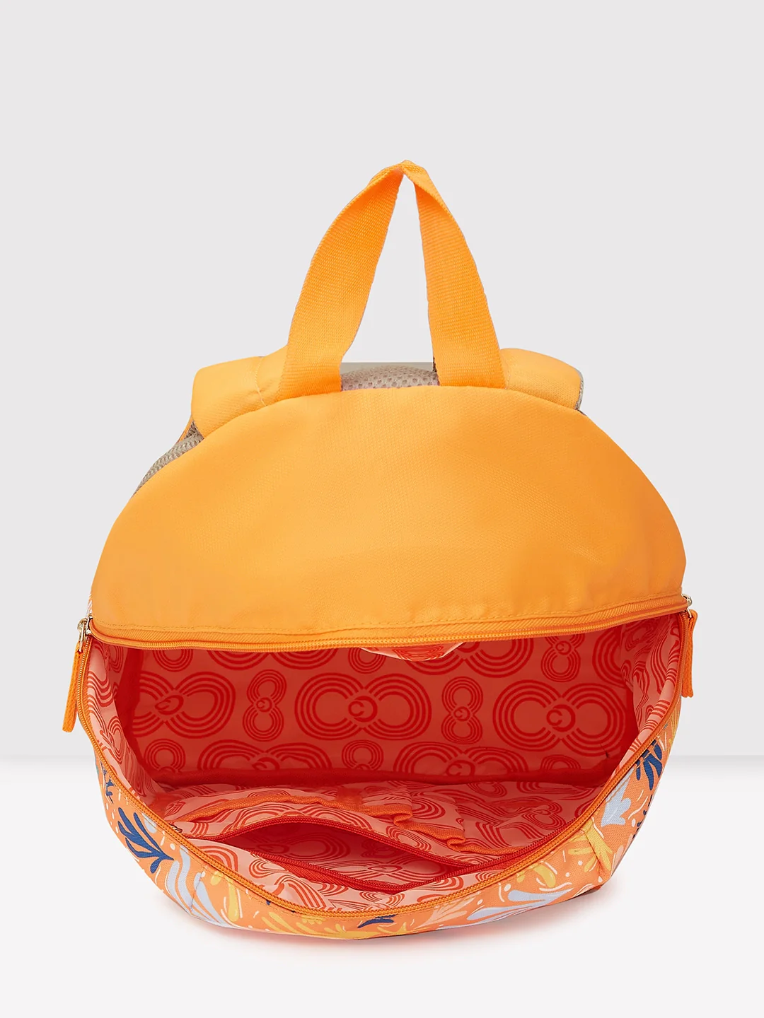 Caprese Xenia Medium Orange Printed Backpack - Image 9