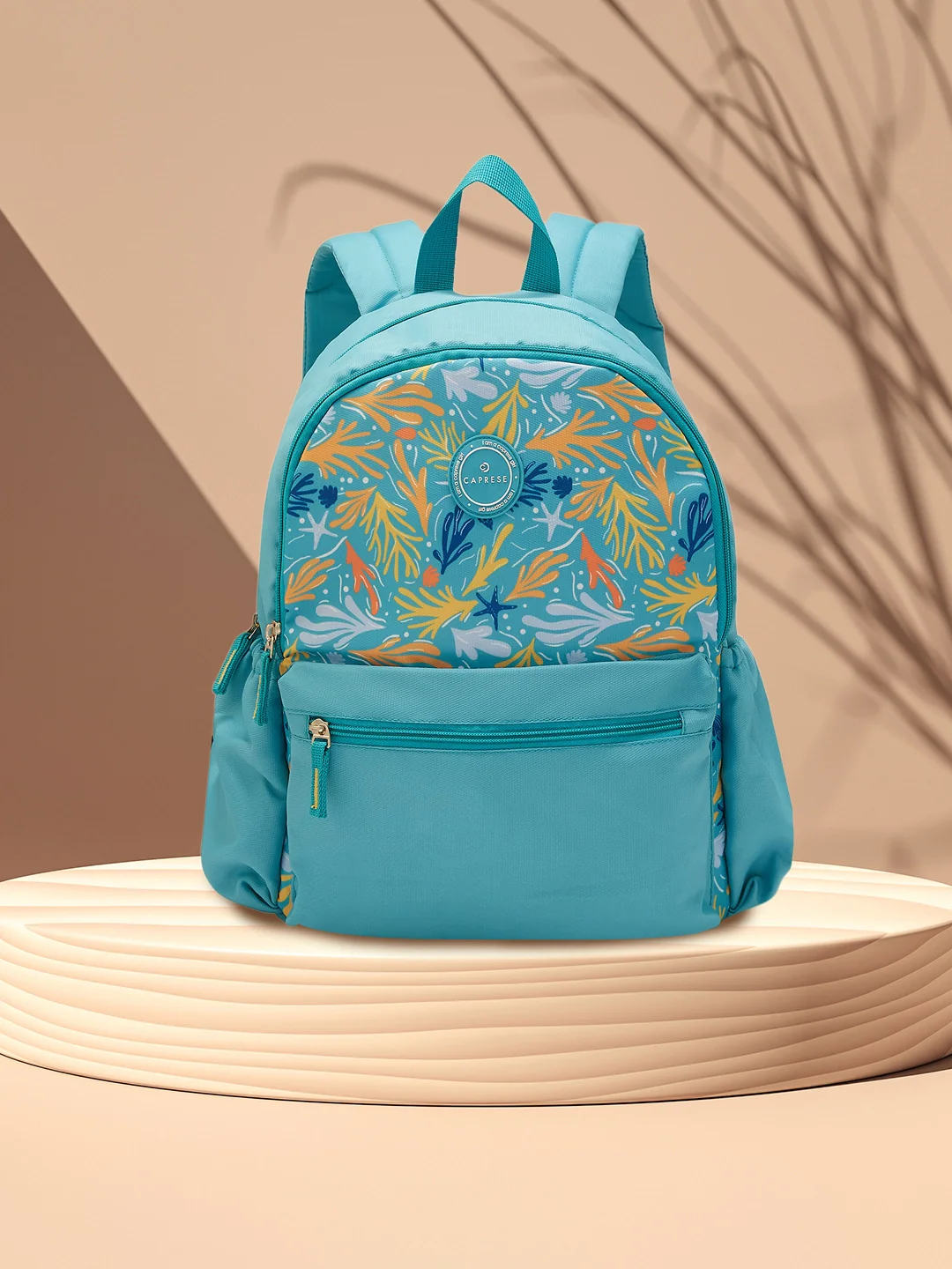 Caprese Xenia Medium Turquoise Printed Backpack - Image 11