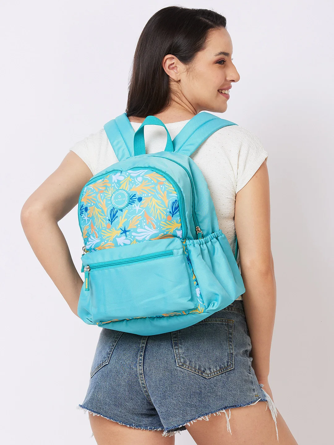 Caprese Xenia Medium Turquoise Printed Backpack - Image 9